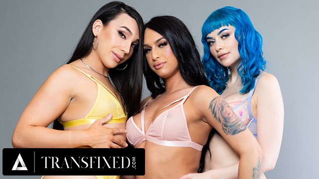 Jewelz Blu and the tgirls spitroast and piledrive in a filthy three-way fuckfest